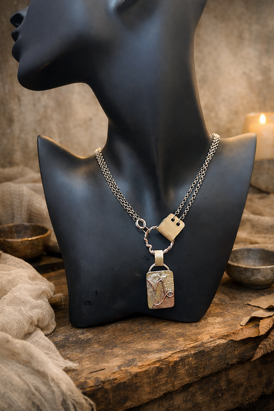 Capricorn mixed metal necklace.  The Zodiac Collection
