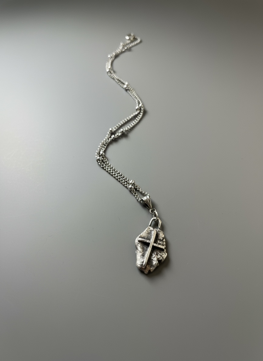 Molten cross pendant