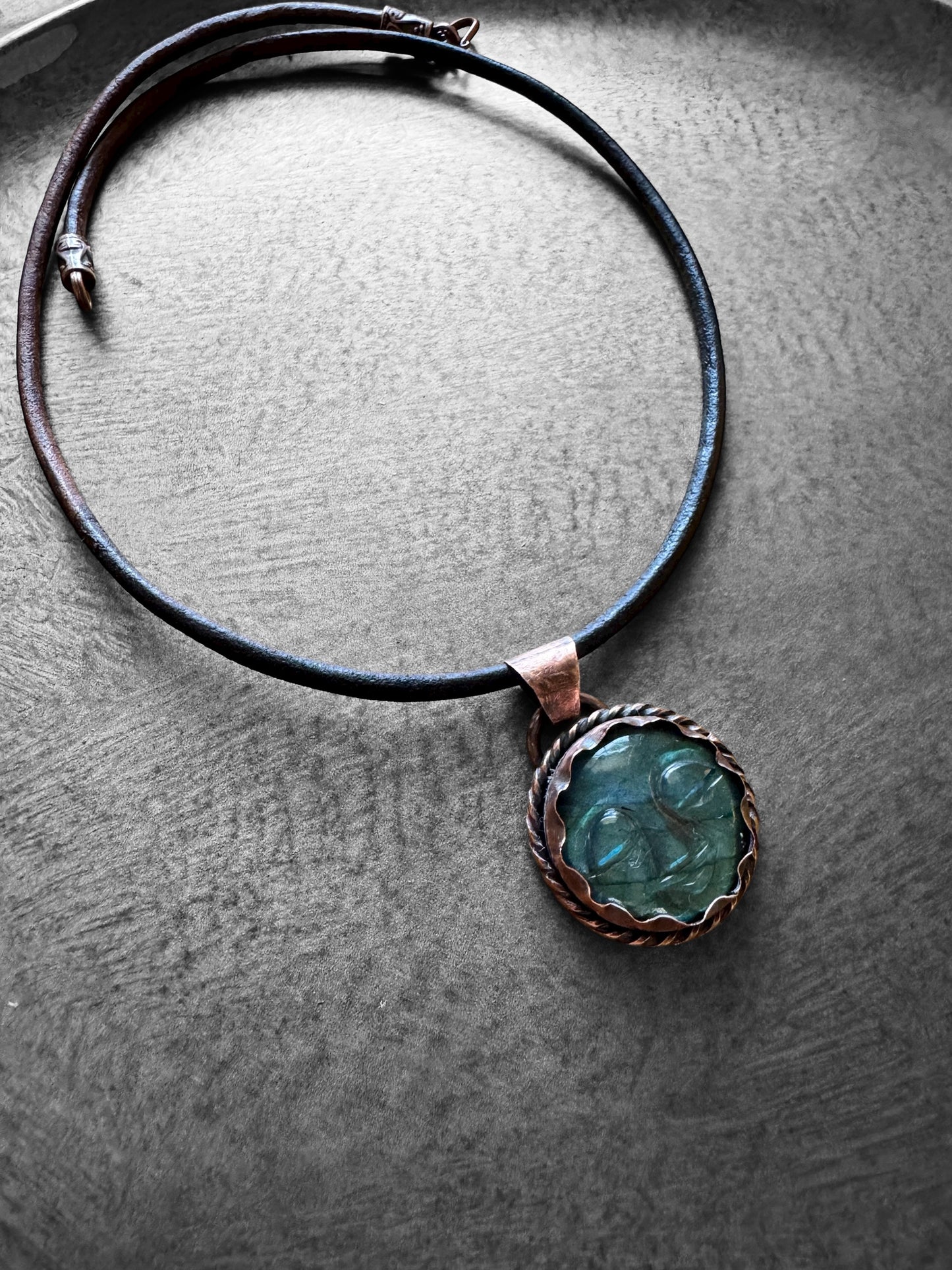 Man in the moon necklace